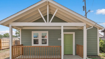 Small accessory dwelling unit home with green door