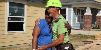 Carter Work Project 2014 volunteer with homeowner