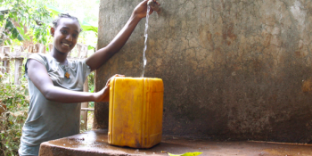 girl getting water