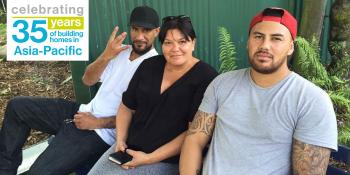 Habitat homeowner Mihi (center) with her sons outside their home in Taranaki, New Zealand