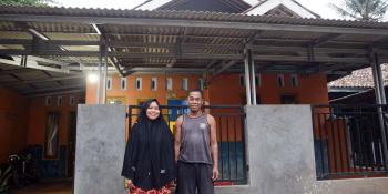 Sani and her husband Ace in front of their house in West Java, Indonesia