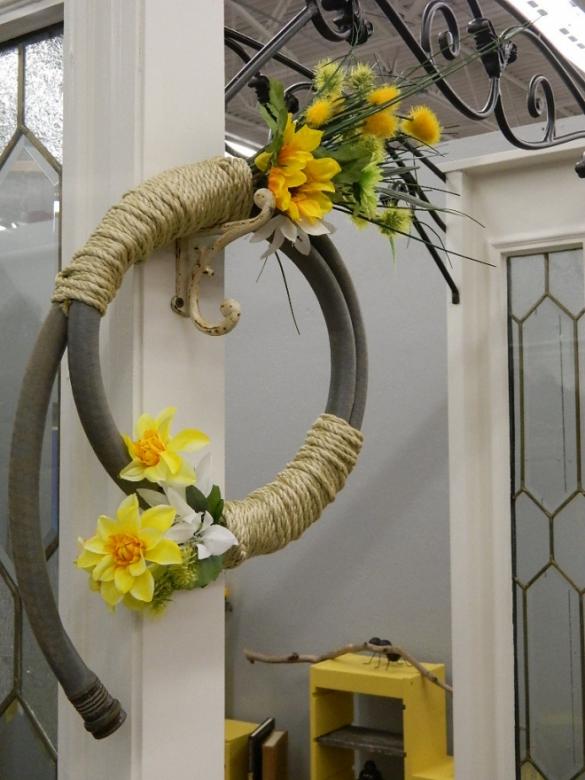 Decorative wreath garden hose with silk flowers