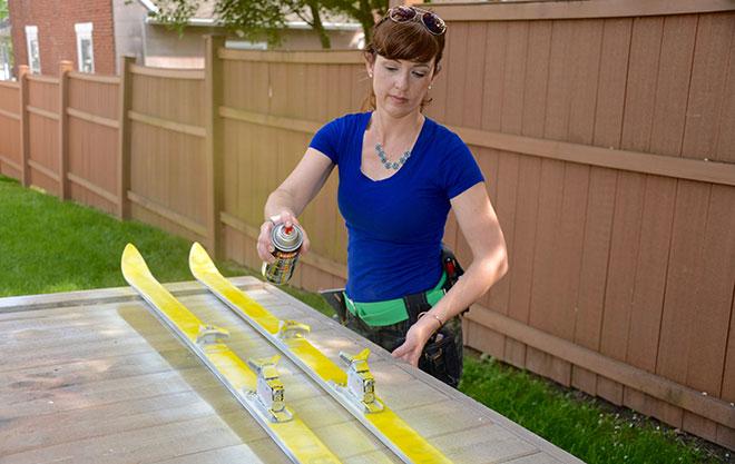 Spray paint skis for DIY tiki torch