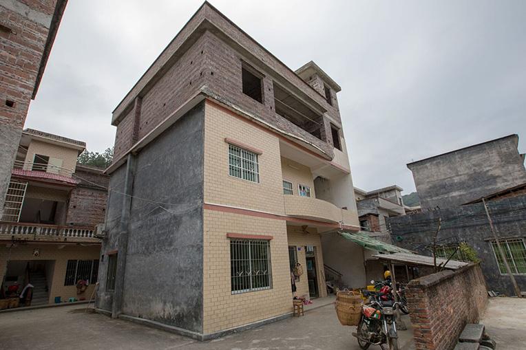 Zhimin would like to complete construction on the third story to provide more room for his daughters.