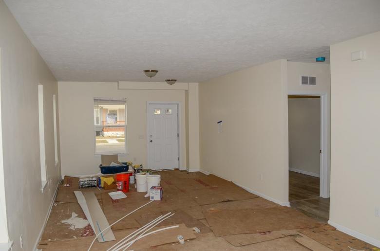 The same room after adding drywall, paint and new flooring.