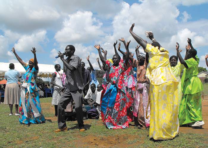Students in Uganda celebrate their completion of nine months of vocational training sponsored by Habitat for Humanity Uganda.