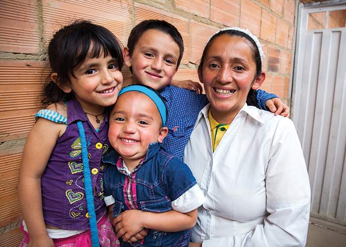 Monica Aldana, a preschool teacher in Soacha, Colombia, renovated her one-room home and made incremental additions with help from Habitat for Humanity Colombia.