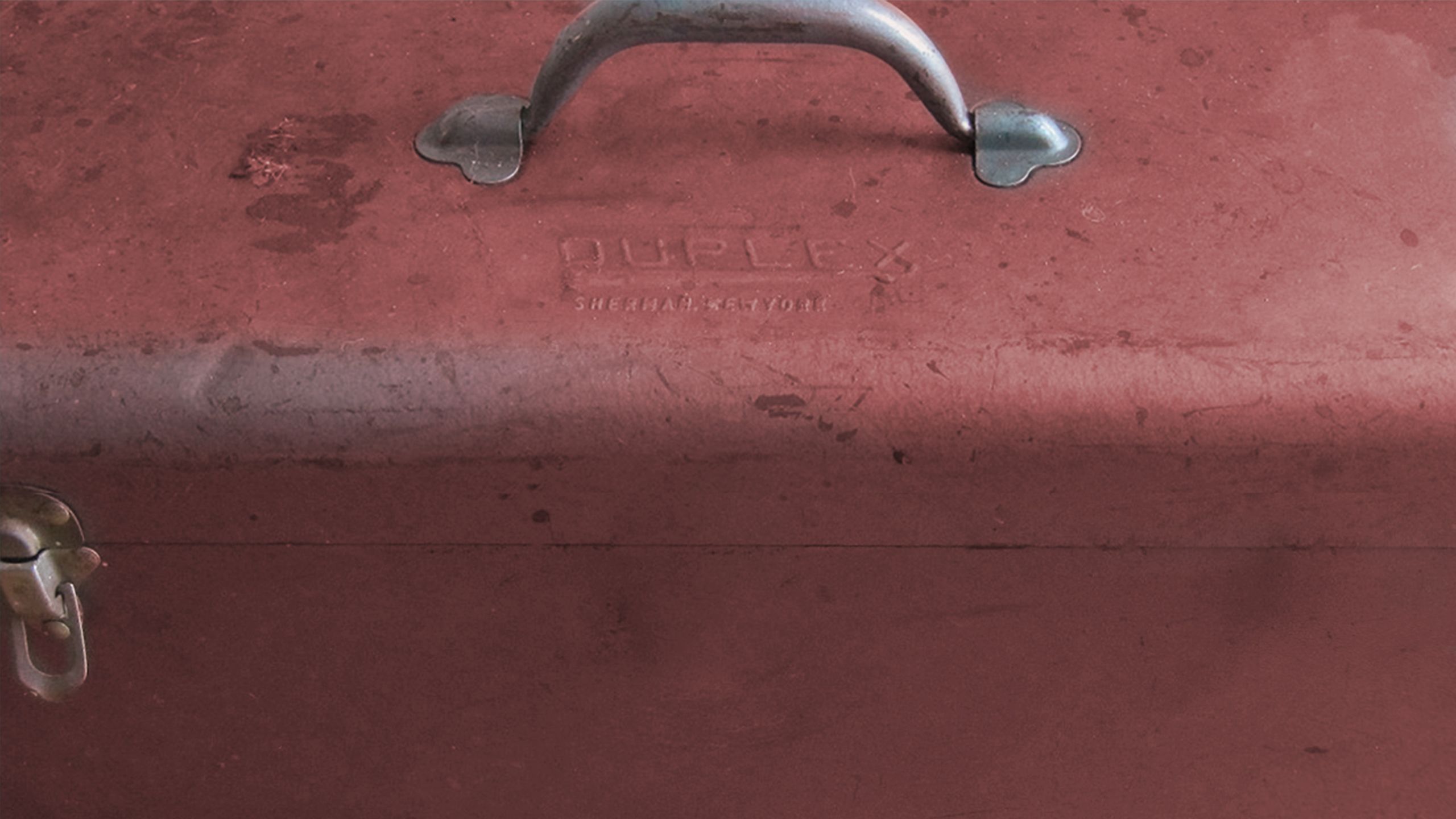 closeup on red metal toolbox