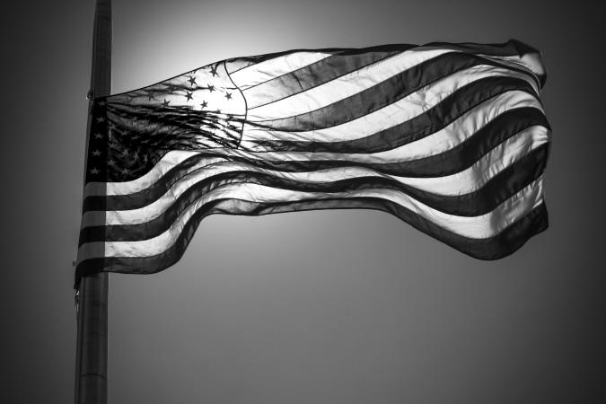 Black and white photo of an American flag.