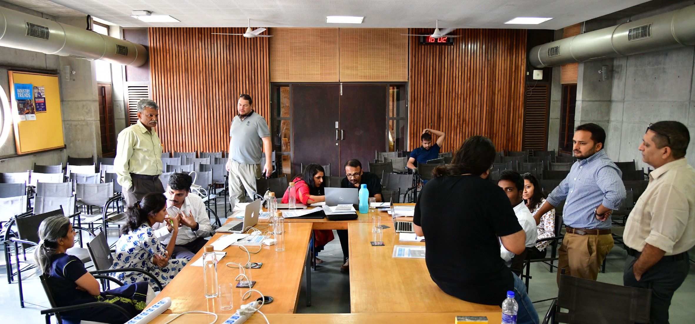 A group of business professionals at a round table.