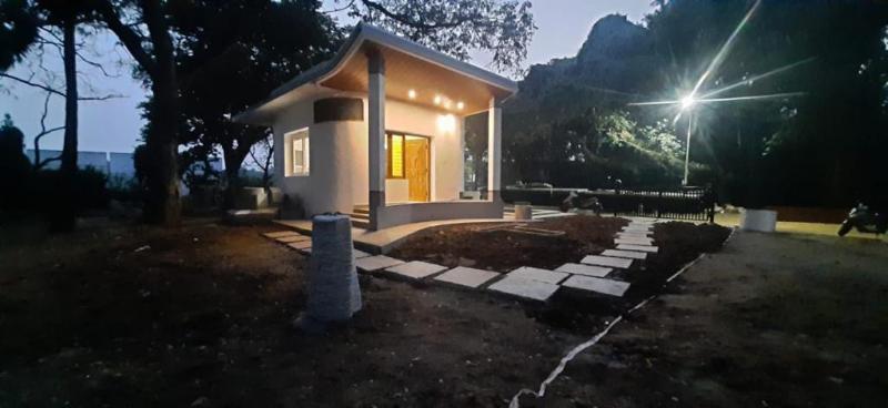 A house with white pillars in front.