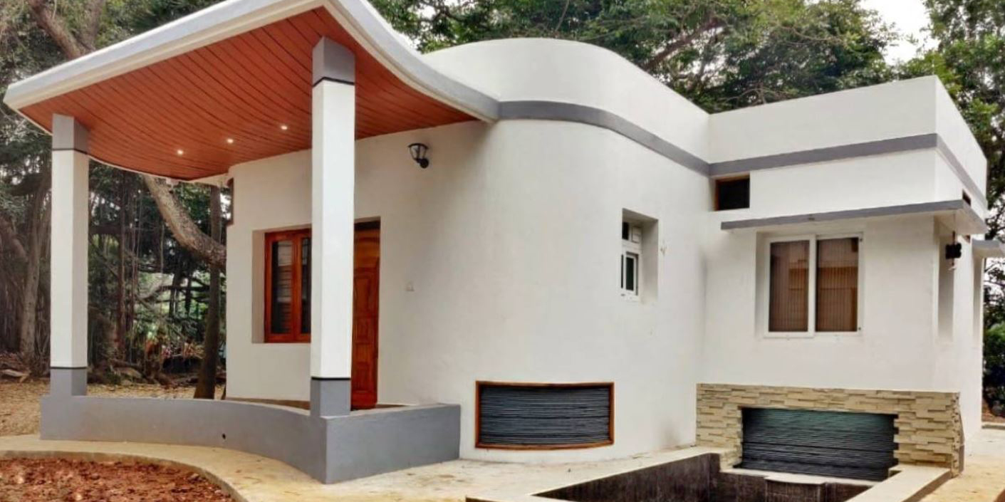 3D-printed white concrete house