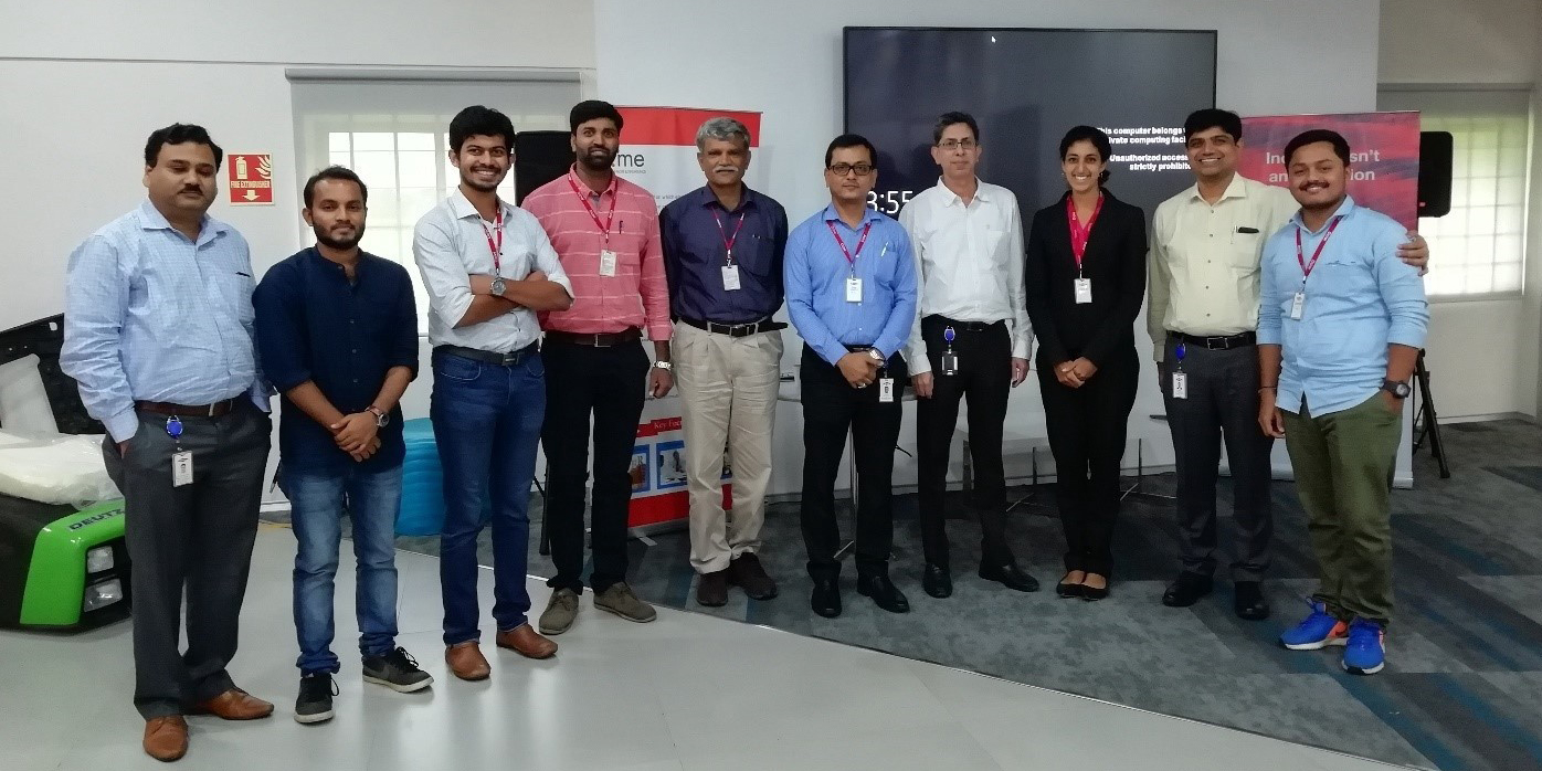 Group photo of people smiling.