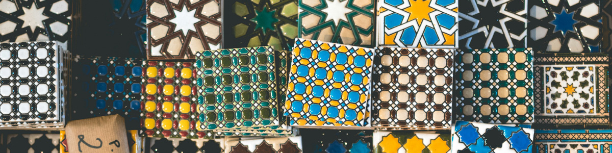 Stacks of colorful patterned tiles.