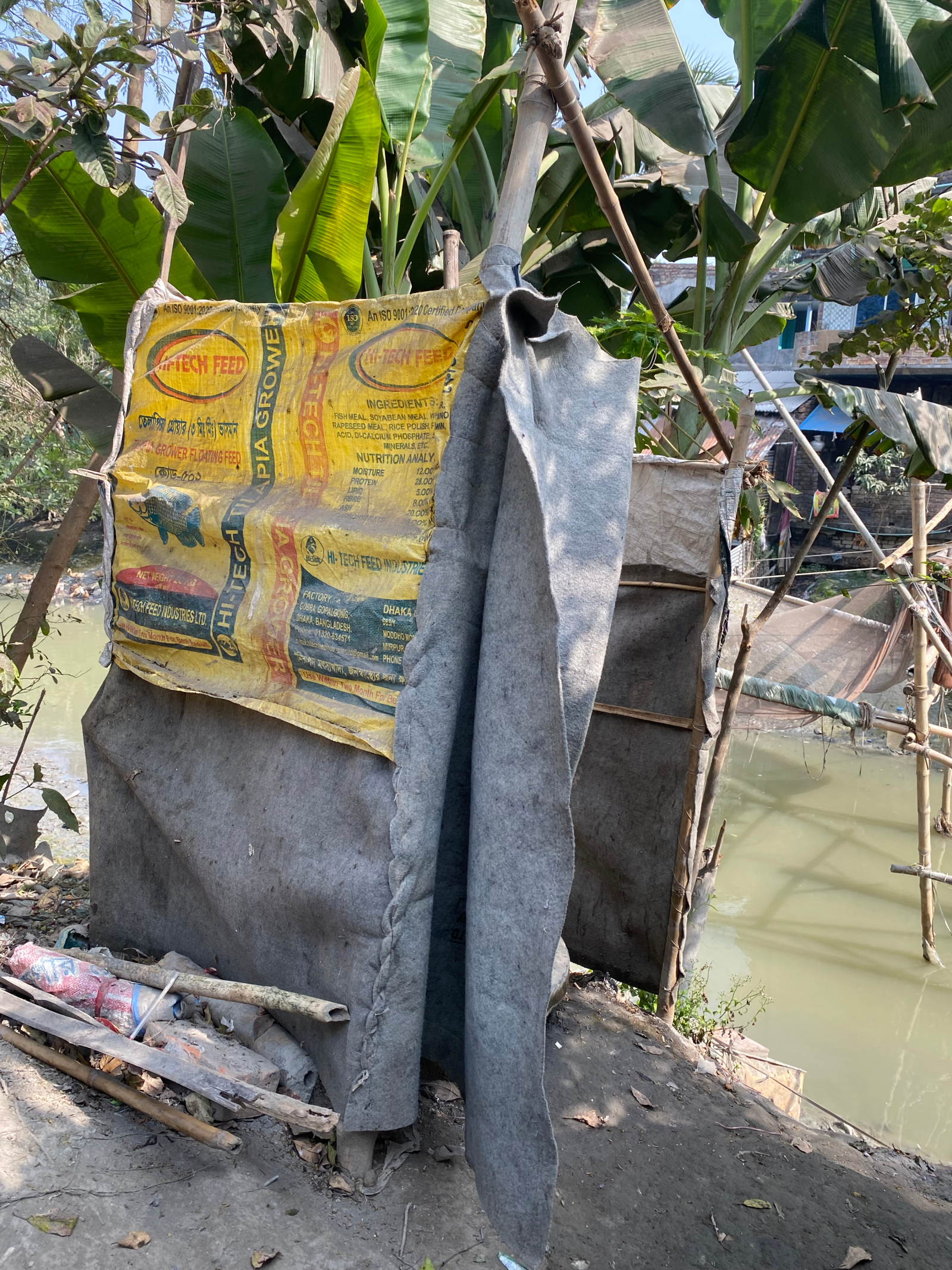 Structure made from found materials, near a flooded area in an informal settlement in Satkhira, Bangladesh. 