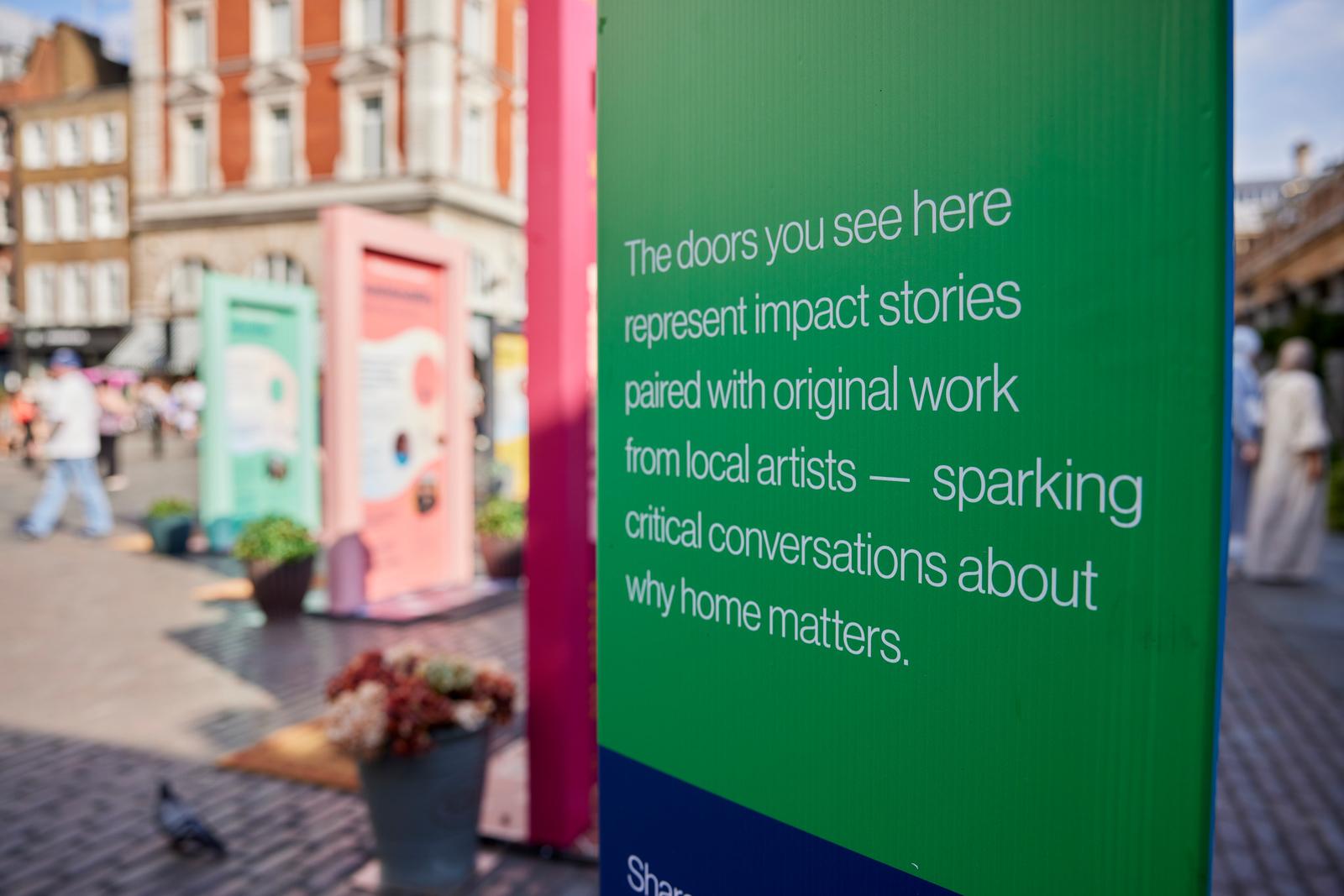The doors you see here represent impact stories paired with original work from local artists - sparking critical conversations about why home matters.