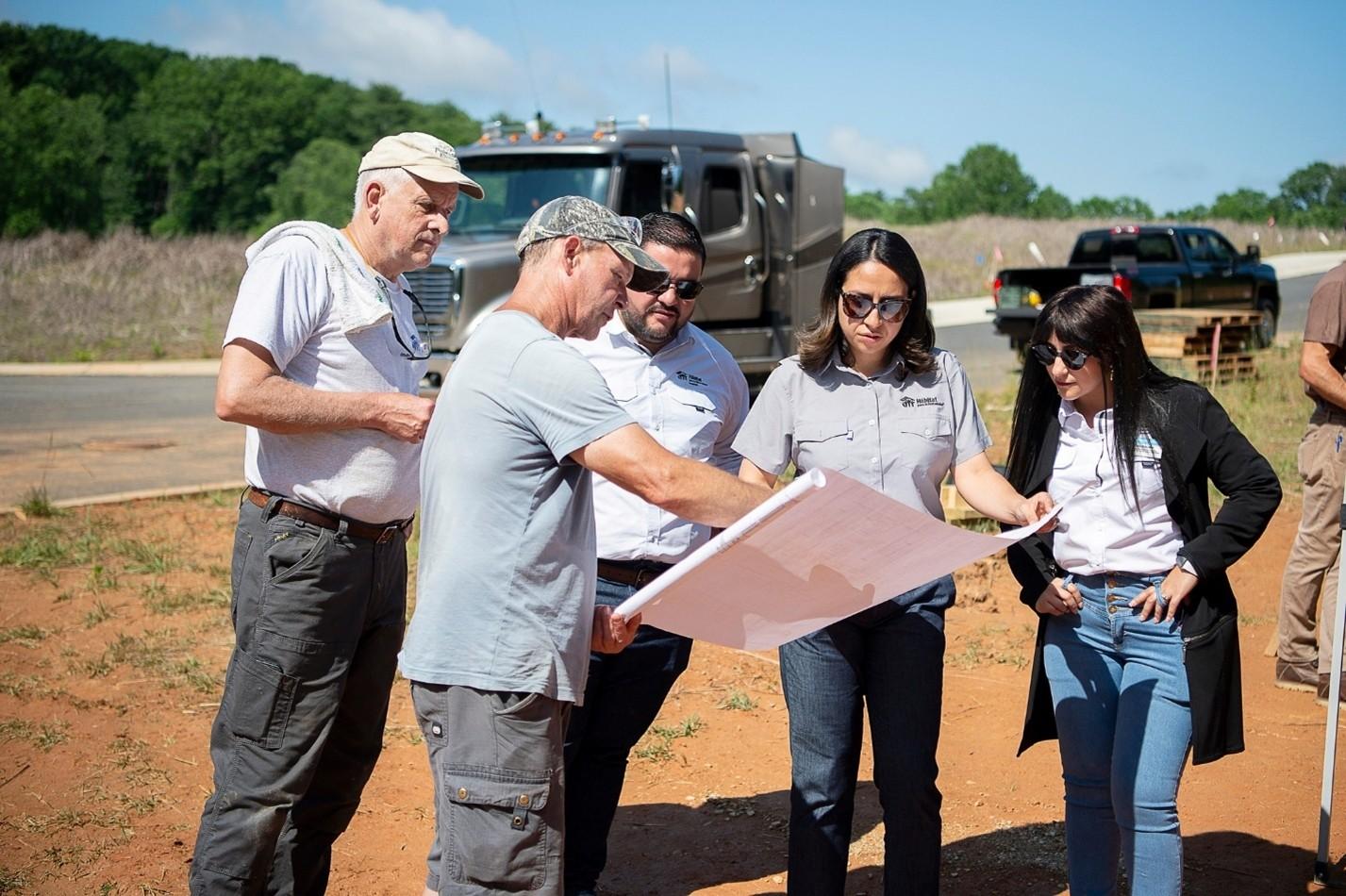 Group of people looking at map