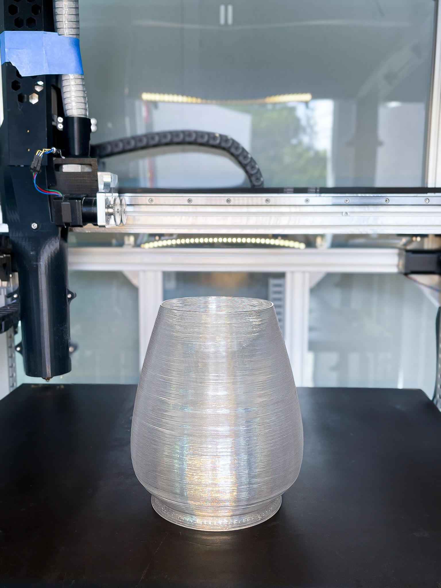 A silver 3D printed home good. 
