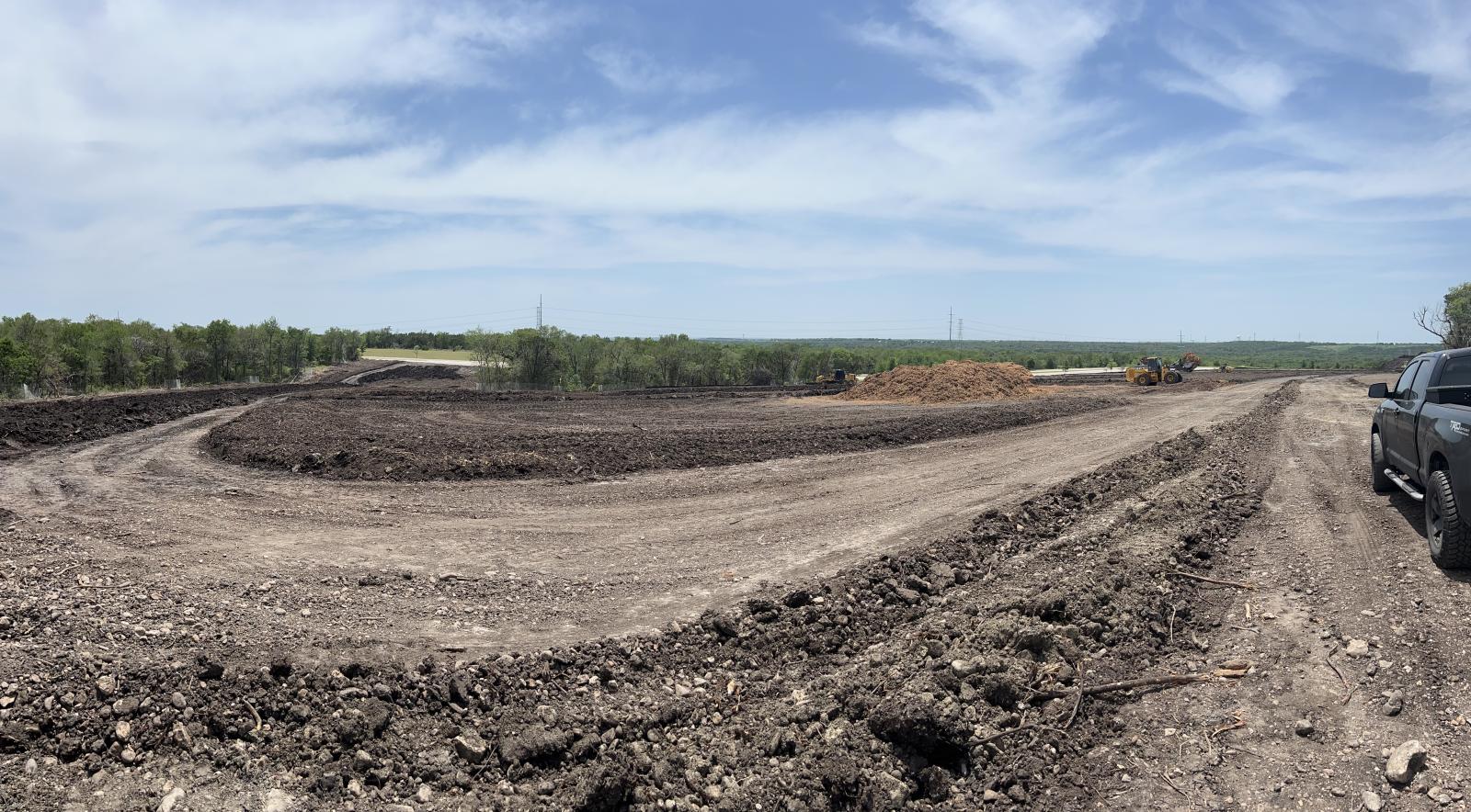 Dirt road being cut in at Whisper Valley site.
