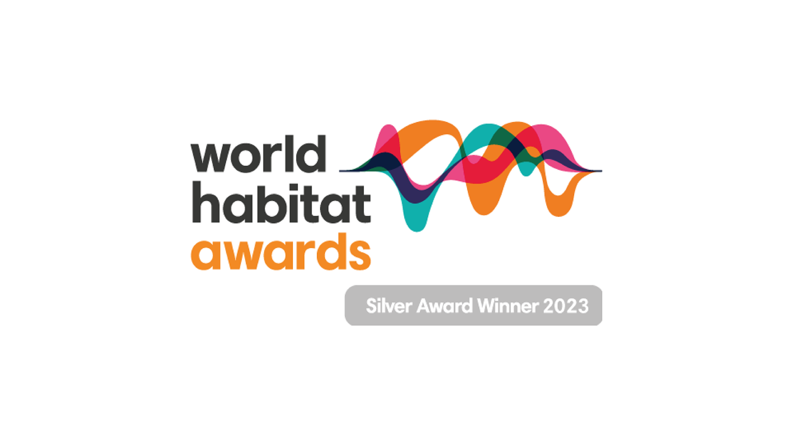 An illustrated image with text that says World Habitat Awards next to an image of a world map in varying colors.