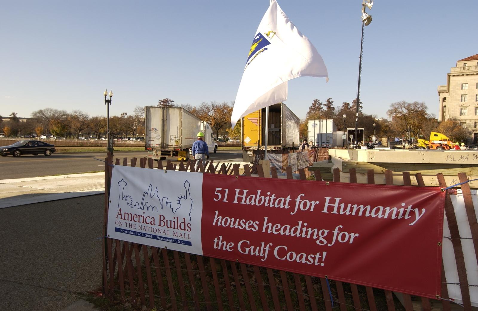 A rig filled with Habitat house frames leaves the National Mall build site for the Gulf Coast.
