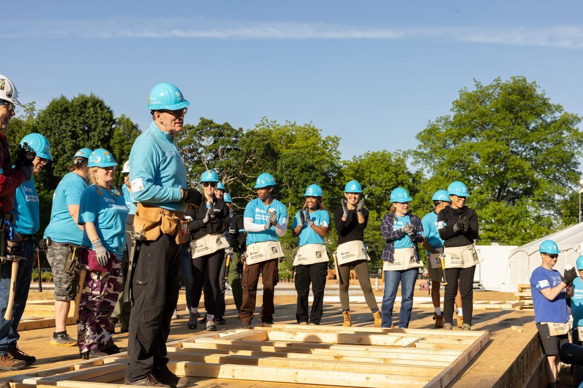 Jonathan gives volunteers a build site pep talk on the first morning of Carter Work Project 2026.