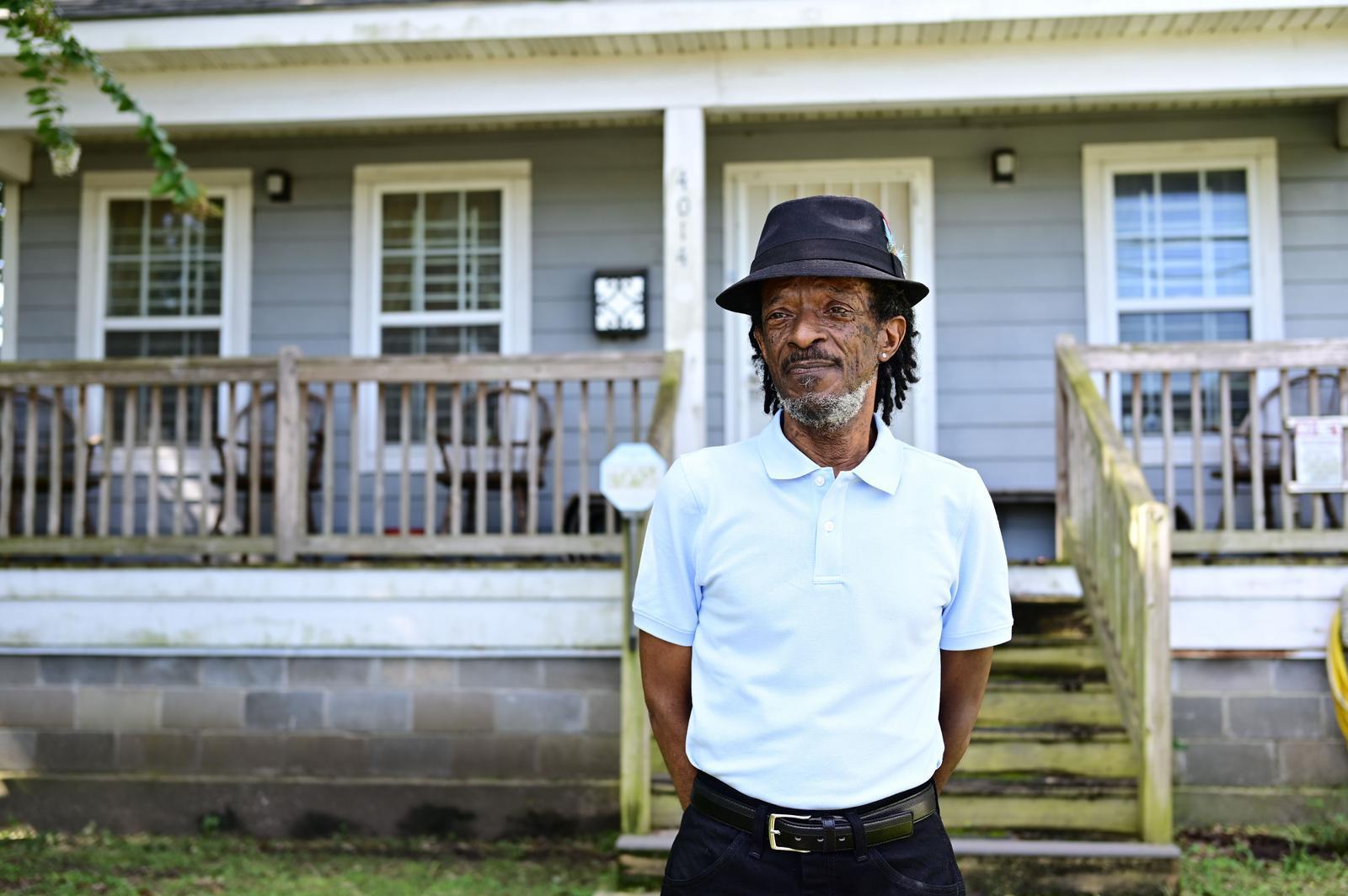 NEW ORLEANS, LOUISIANA, USA (07/09/2025) — Michael Harris outside his home in the Musicians Village in the Upper Ninth Ward, which was built after Hurricane Katrina nearly 20 years ago.