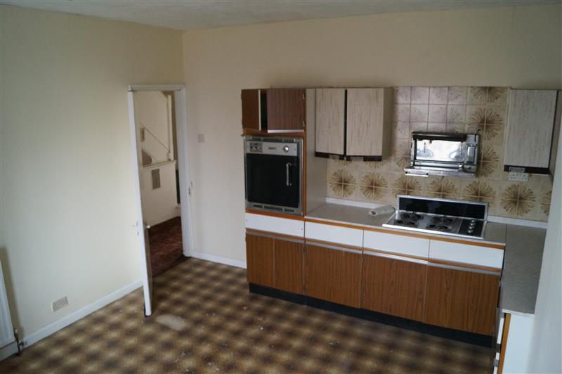 An outdated kitchen before refurbishing