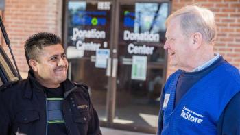 A customer donates goods to Habitat ReStore