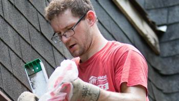 TJ on a Habitat build site