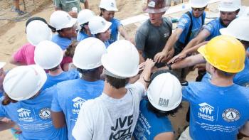 AmeriCorps group circle Build-a-Thon Habitat for Humanity