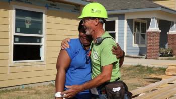 Carter Work Project 2014 volunteer and homeowner