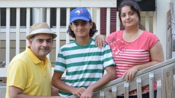 Des Moines homeowner family in front of house