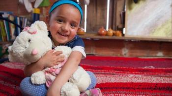 Ana Maria Aldana holding teddy bear