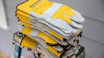 Why volunteer? Habitat for Humanity stack of work gloves