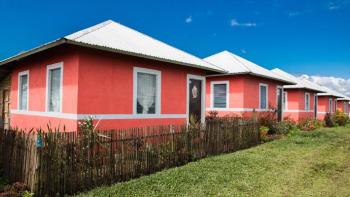 Row of pink houses, Philippines, MicroBuild Fund, Habitat for Humanity