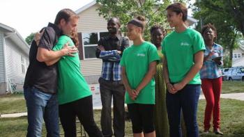 Home builders help build Habitat for Humanity communities, Jim and Habitat family, Habitat for Humanity