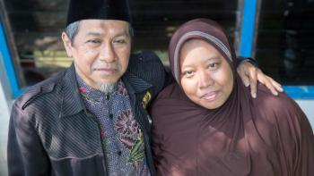Ilyas, principal of SD Mustajabah school in Tegal Sari, and his wife Fatima