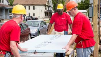 KeyBank volunteers on a build site. 