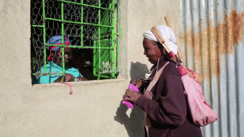 two-women-talking-land-registration