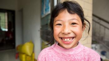 Xinyi, 8, lives in a Habitat house in southern China that was built by her grandfather more than a decade ago. Photo: Habitat for Humanity/Jason Asteros.