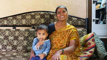 Lata, seen with her neighbor's son, built her home during 2006 Carter Work Project in Lonavala, India 