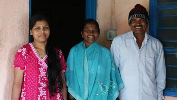 Malan (center) was among 100 families who built new homes during the 2006 Jimmy & Rosalynn Carter Work Project in Lonavala, India.