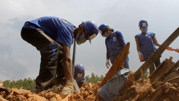 Volunteers clearing rubble in earthquake-hit Nepal