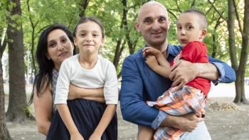 Asia and Edik with their two children.