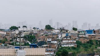 Photo: city of Alta de Santa Terezinha in Brazil. Contrast of slum areas and rich part of the city.