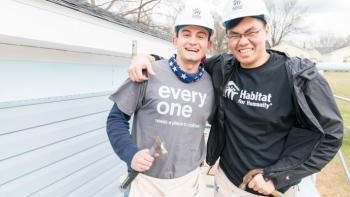 Two volunteers on the build site.