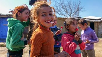 Children outside their shelters in Lebanon refugee camp