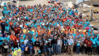 Group photo of volunteers with President and Mrs. Carter.