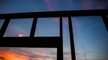 Silhouette of a home being built.